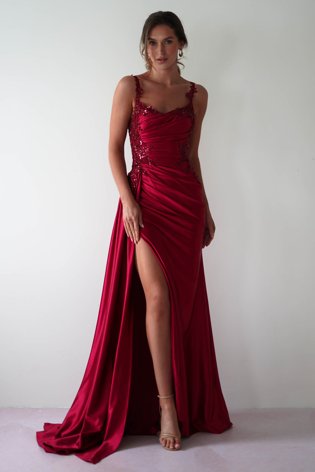 Cindy Pleated Bodice Gown in burgundy – styled with heels | Velora premium burgundy dresses