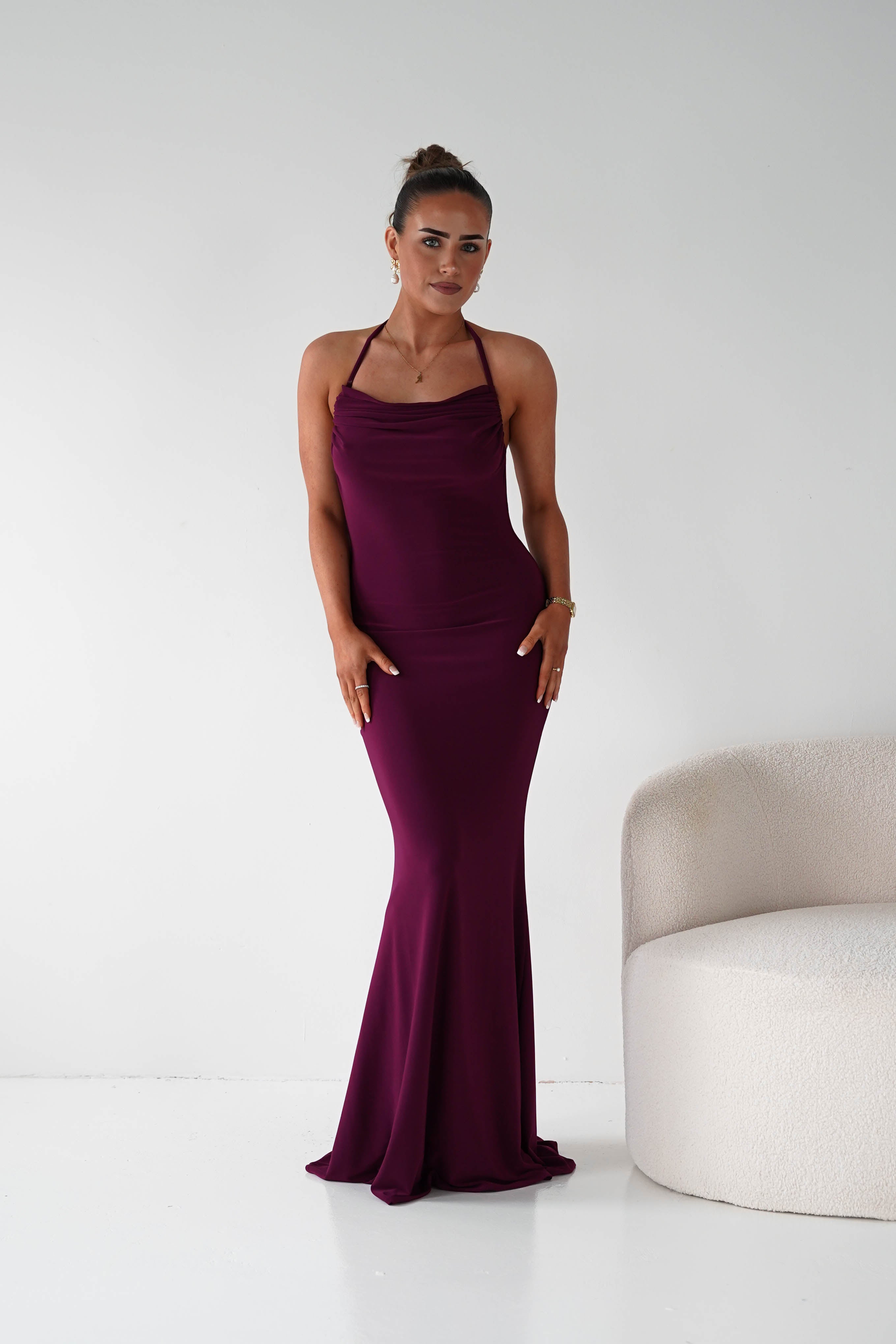 Maia Multi-Way Bodycon Maxi Dress in wine – styled with heels | Velora premium burgundy dresses