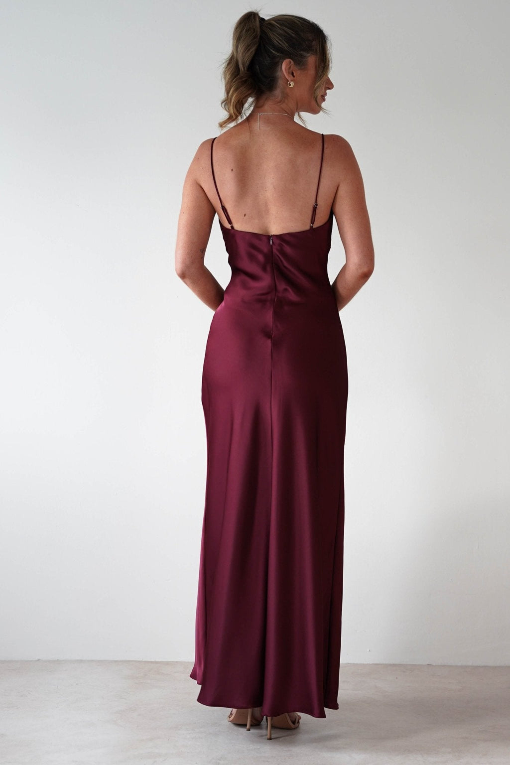 Adley Soft Satin Maxi Dress in burgundy – styled with heels | Velora premium burgundy dresses