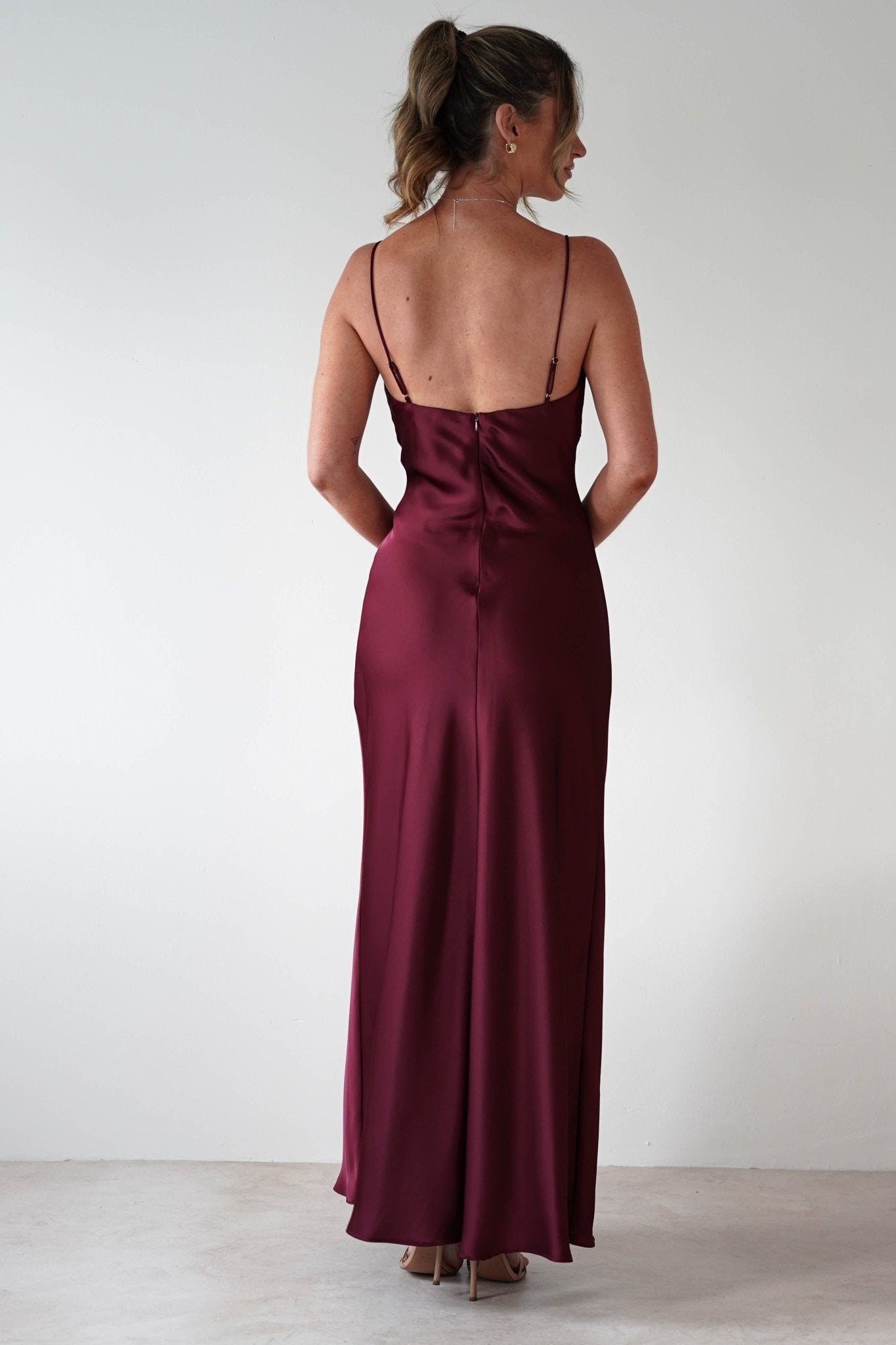 Adley Soft Satin Maxi Dress in burgundy – styled with heels | Velora premium burgundy dresses