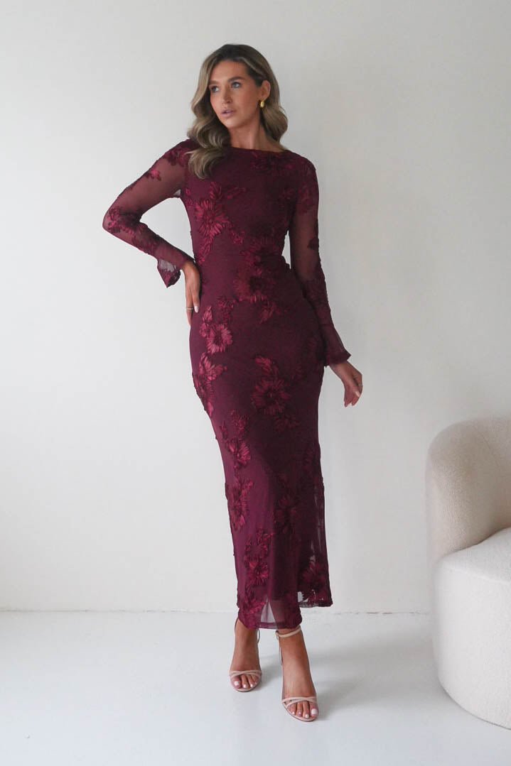 Amelita Long Sleeve Embroidered Maxi Dress in wine – seated view | Velora premium burgundy dresses