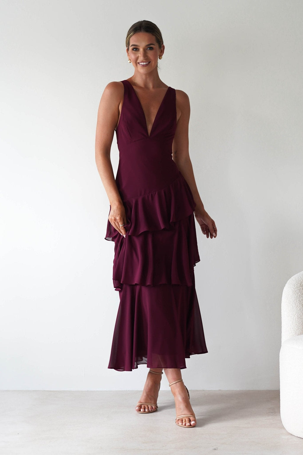Andalusia Ruffle Maxi Dress in wine – seated view | Velora premium burgundy dresses