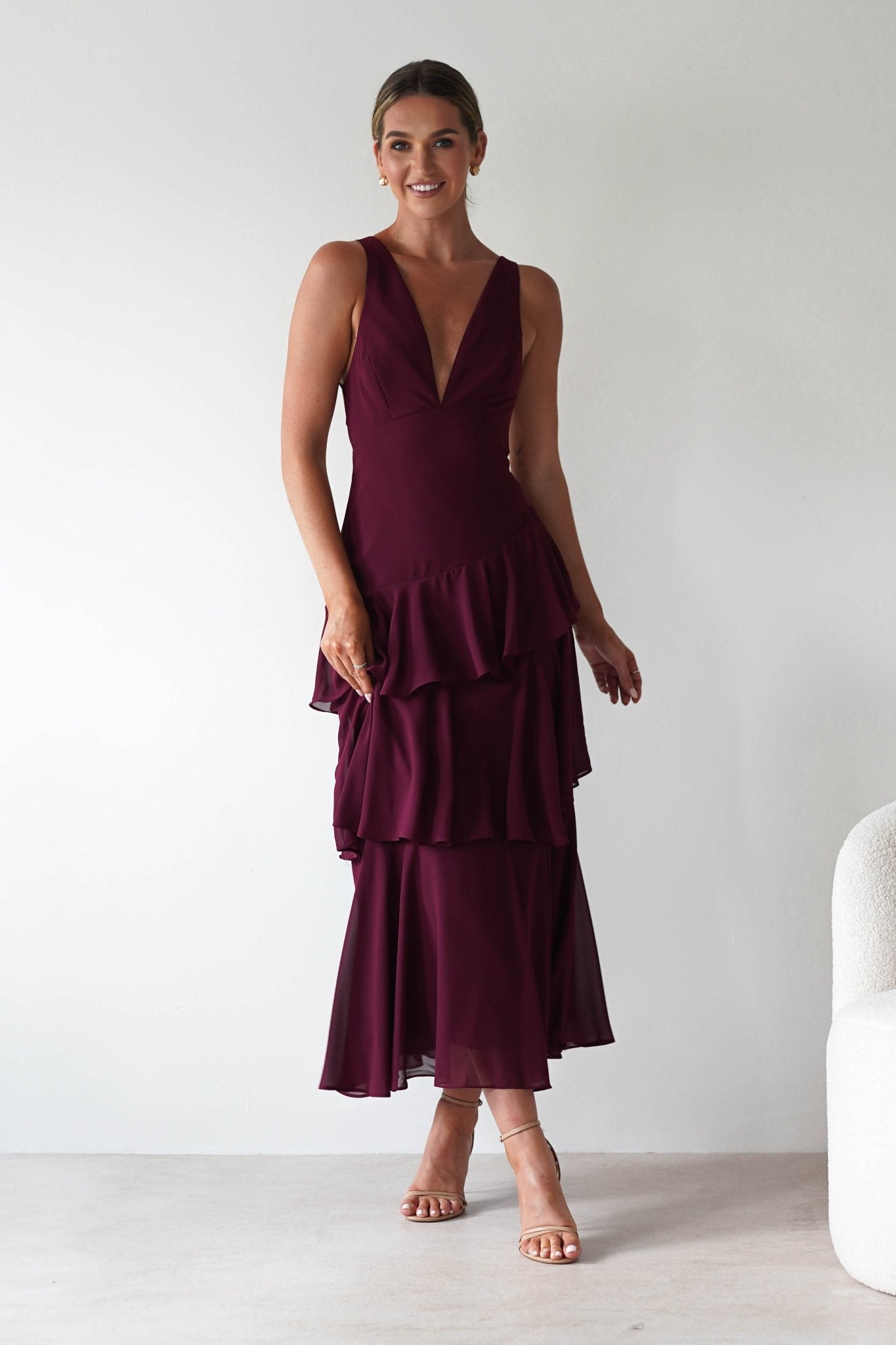 Andalusia Ruffle Maxi Dress in wine – seated view | Velora premium burgundy dresses