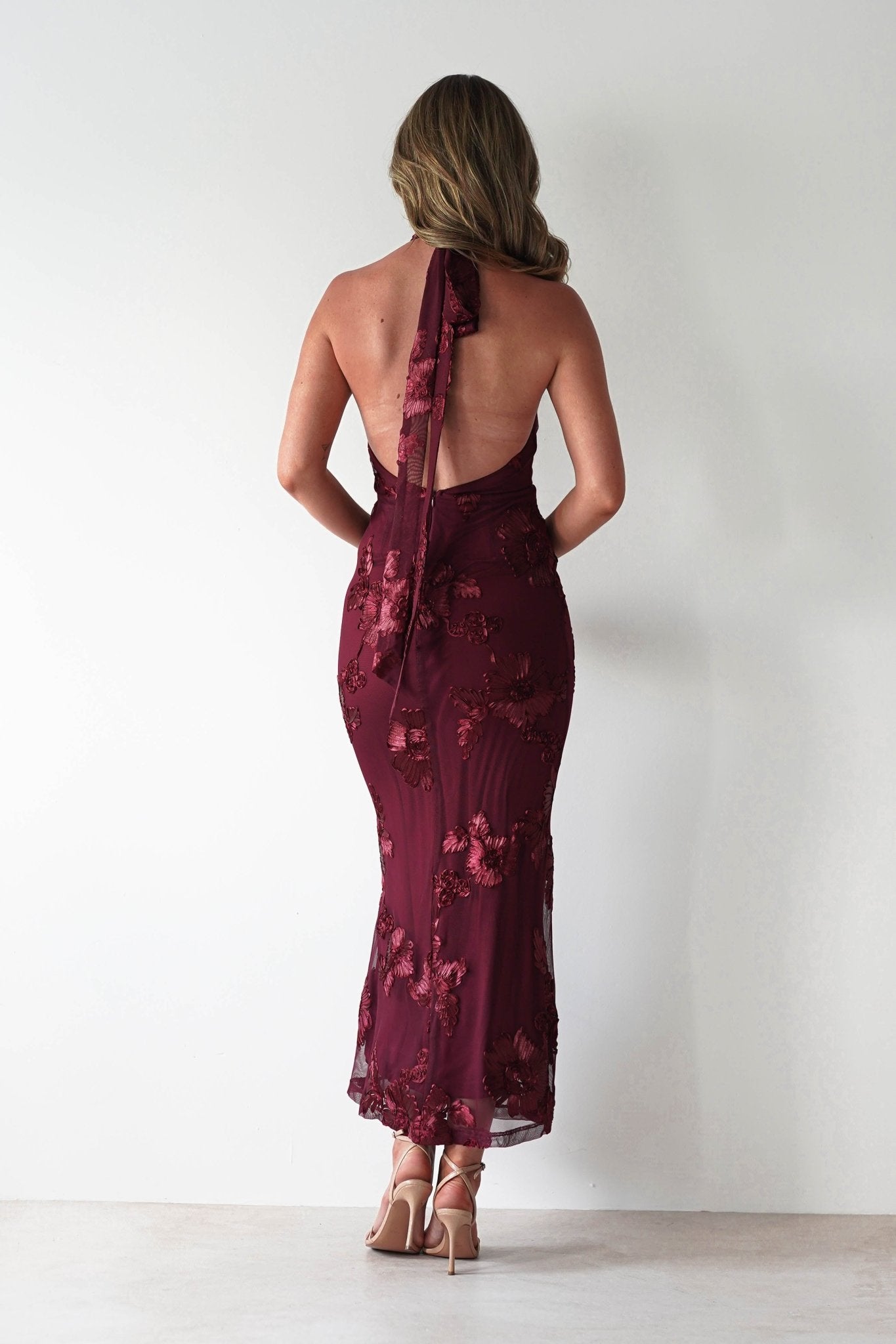 Halsey Tie Back Maxi Dress in wine textured – back view | Velora premium burgundy dresses