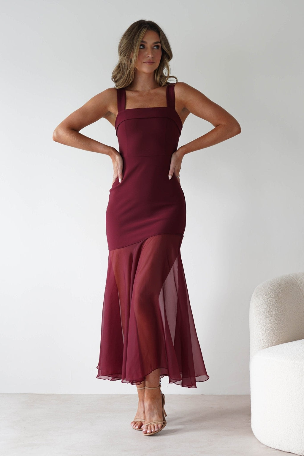 Harmony Square Neck Bodycon Maxi Dress in wine – seated view | Velora premium burgundy dresses