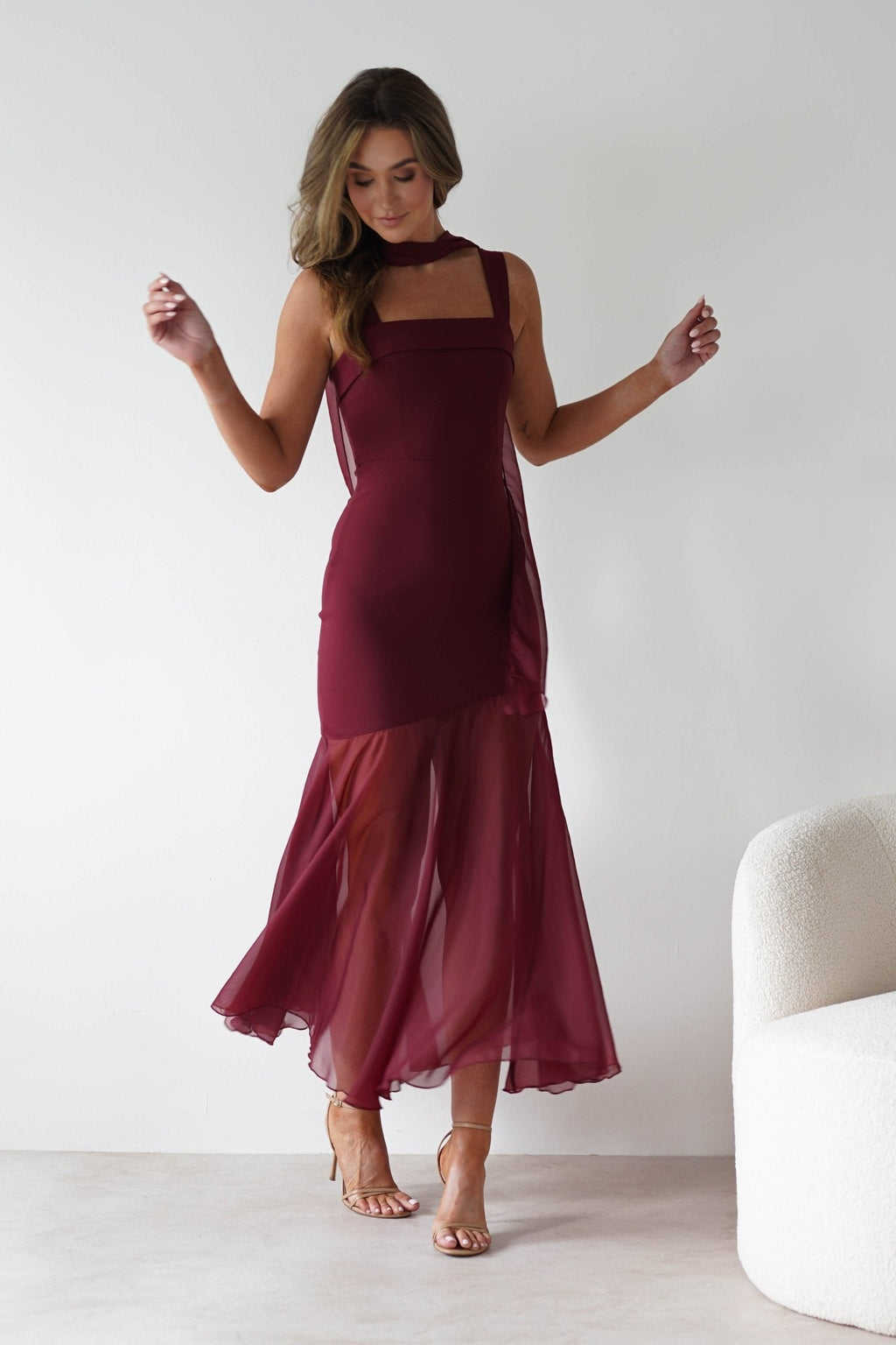 Harmony Square Neck Bodycon Maxi Dress in wine – movement shot | Velora premium burgundy dresses