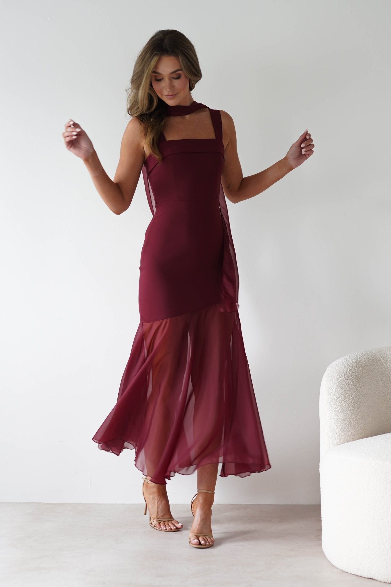 Harmony Square Neck Bodycon Maxi Dress in wine – movement shot | Velora premium burgundy dresses