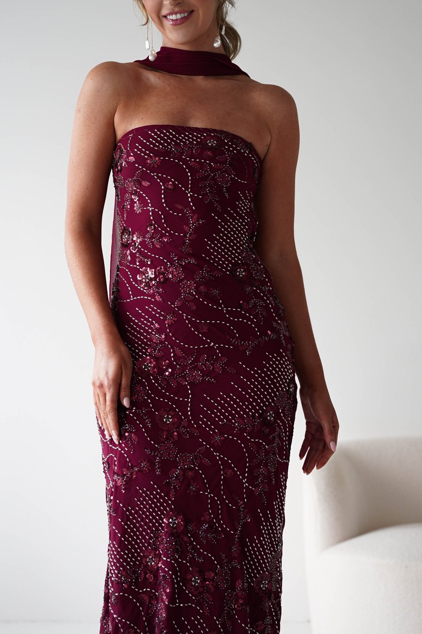 Hayleigh Beaded Strapless Maxi Dress in wine – styled with heels | Velora premium burgundy dresses