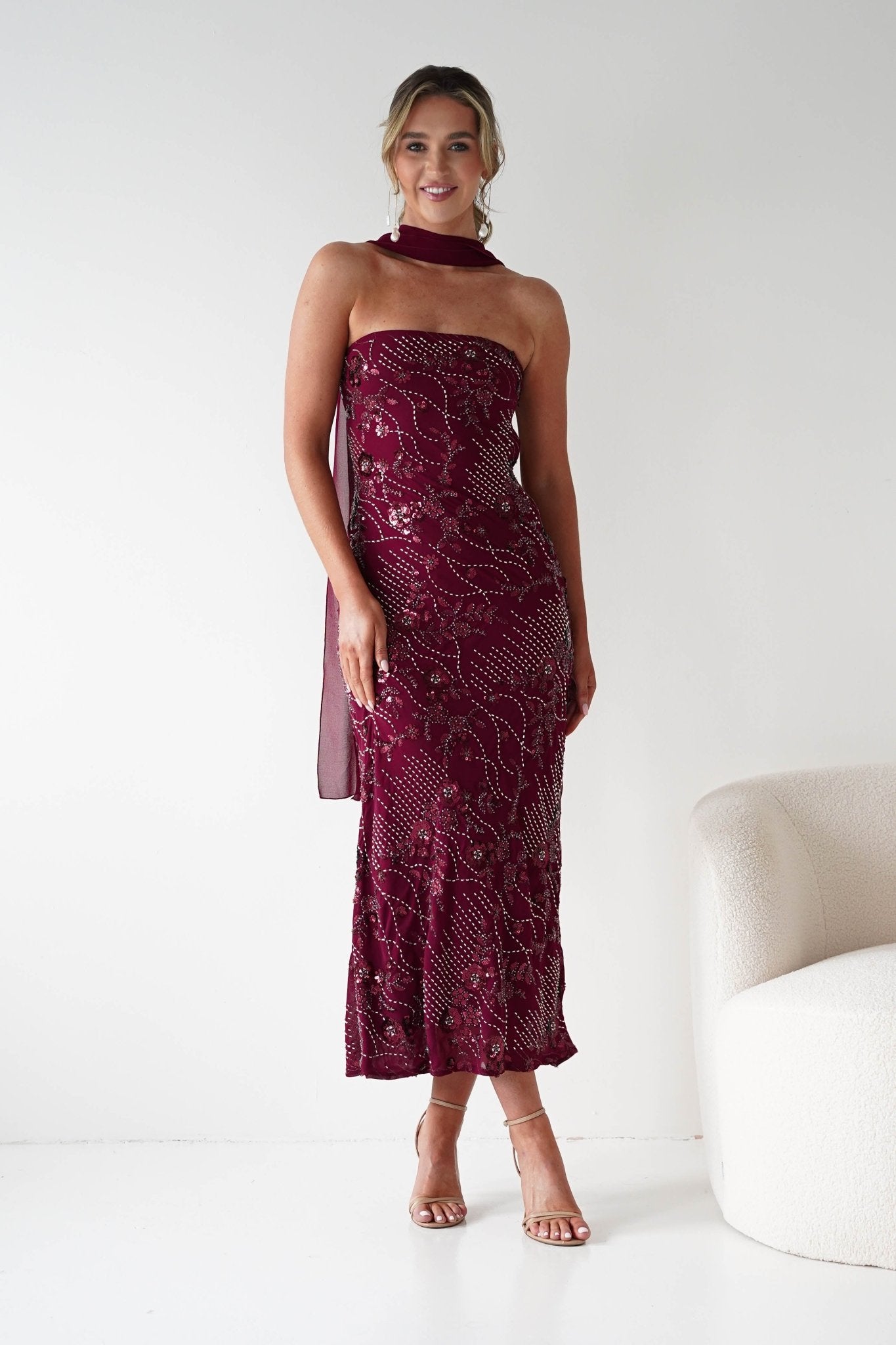 Hayleigh Beaded Strapless Maxi Dress in wine – seated view | Velora premium burgundy dresses
