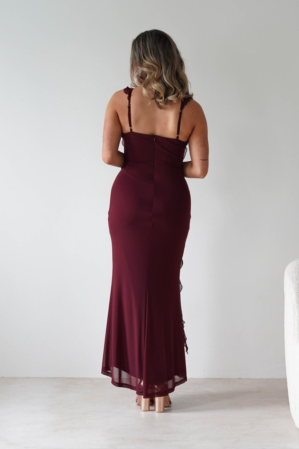 Mhissa Ruffle Maxi Dress in burgundy – hem detail | Velora premium burgundy dresses