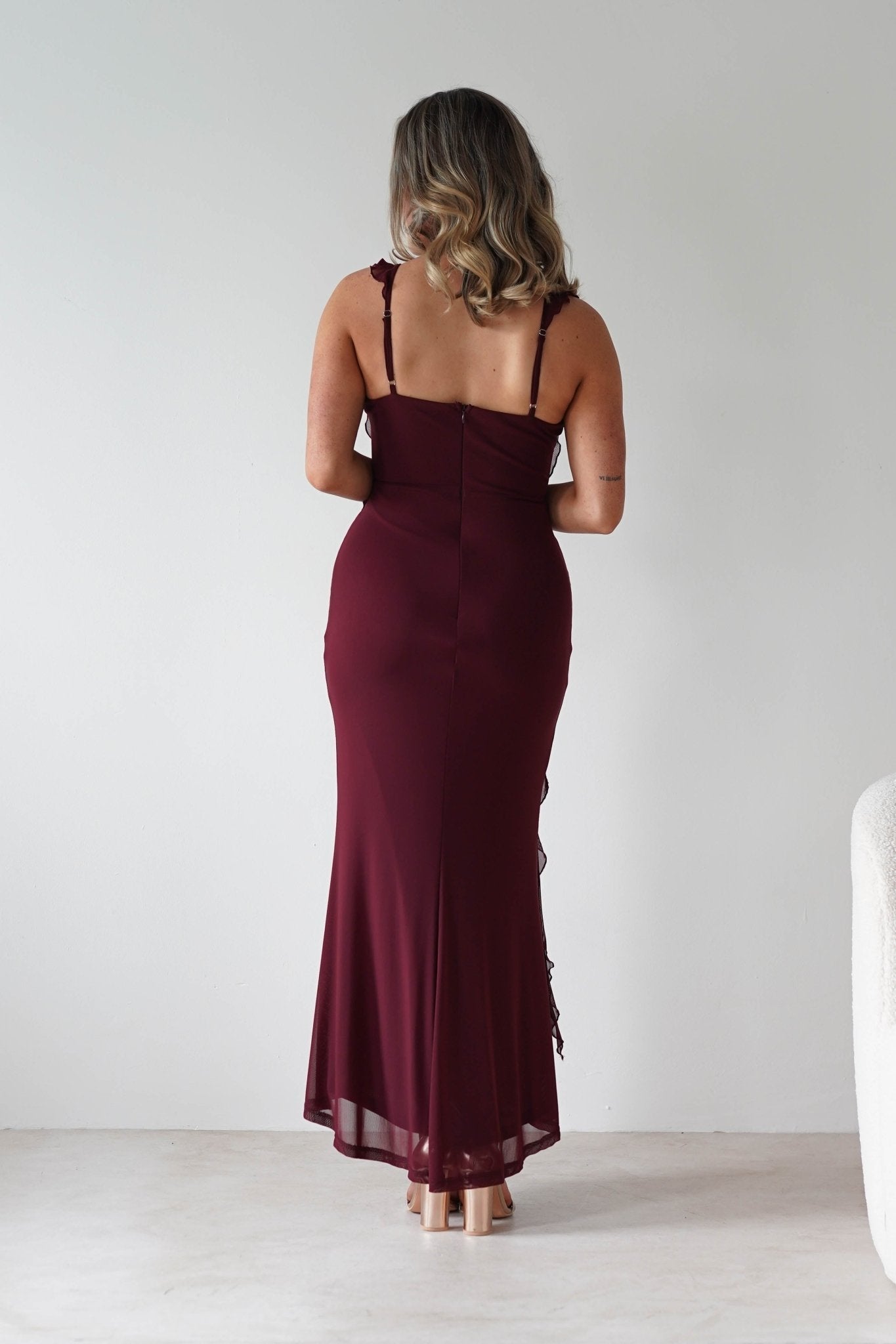 Mhissa Ruffle Maxi Dress in burgundy – hem detail | Velora premium burgundy dresses