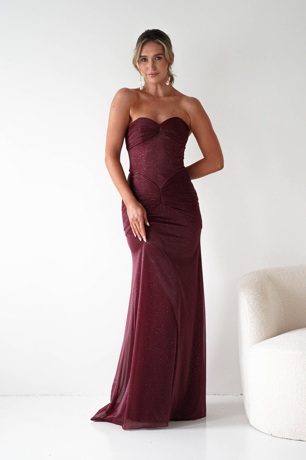 Nicola Strapless Glitter Gown in burgundy – close-up detail | Velora premium burgundy dresses