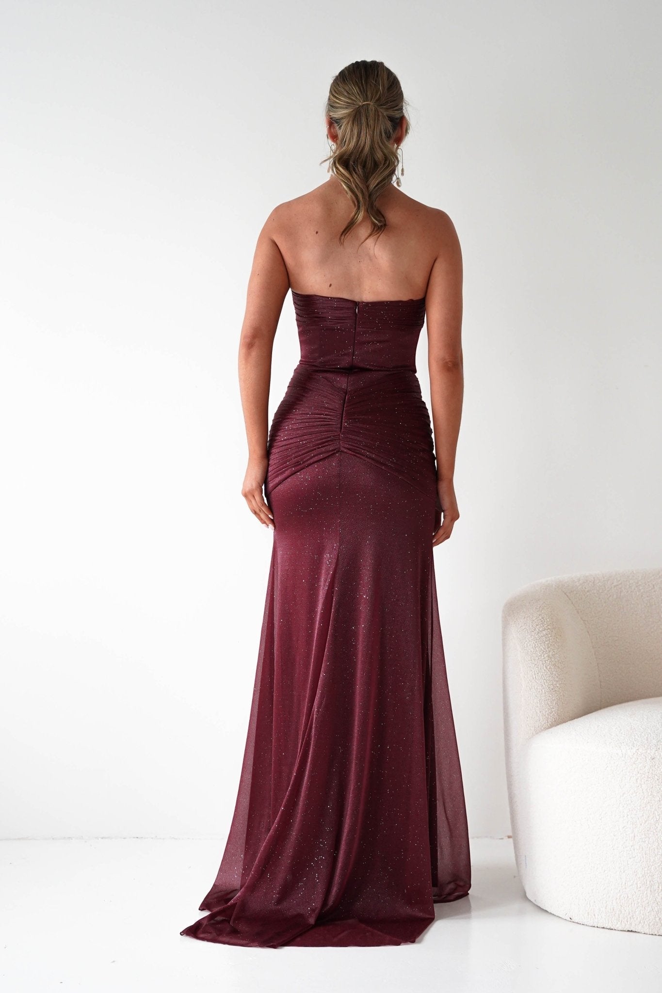 Nicola Strapless Glitter Gown in burgundy – back view | Velora premium burgundy dresses