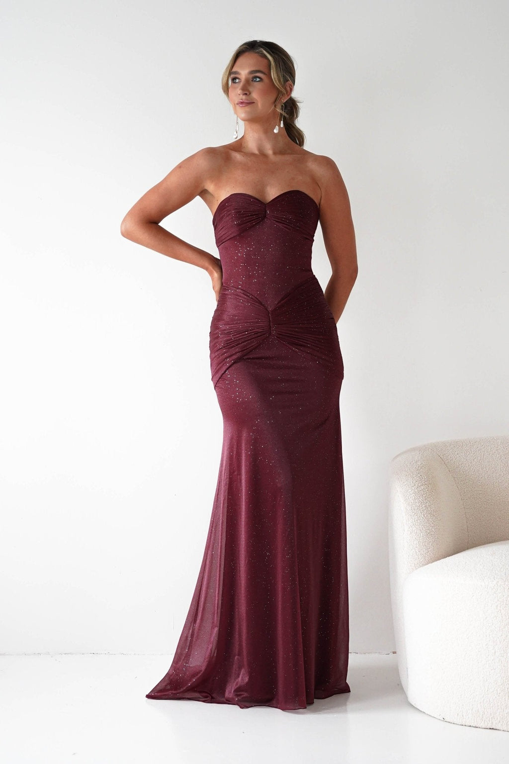 Nicola Strapless Glitter Gown in burgundy – side view | Velora premium burgundy dresses