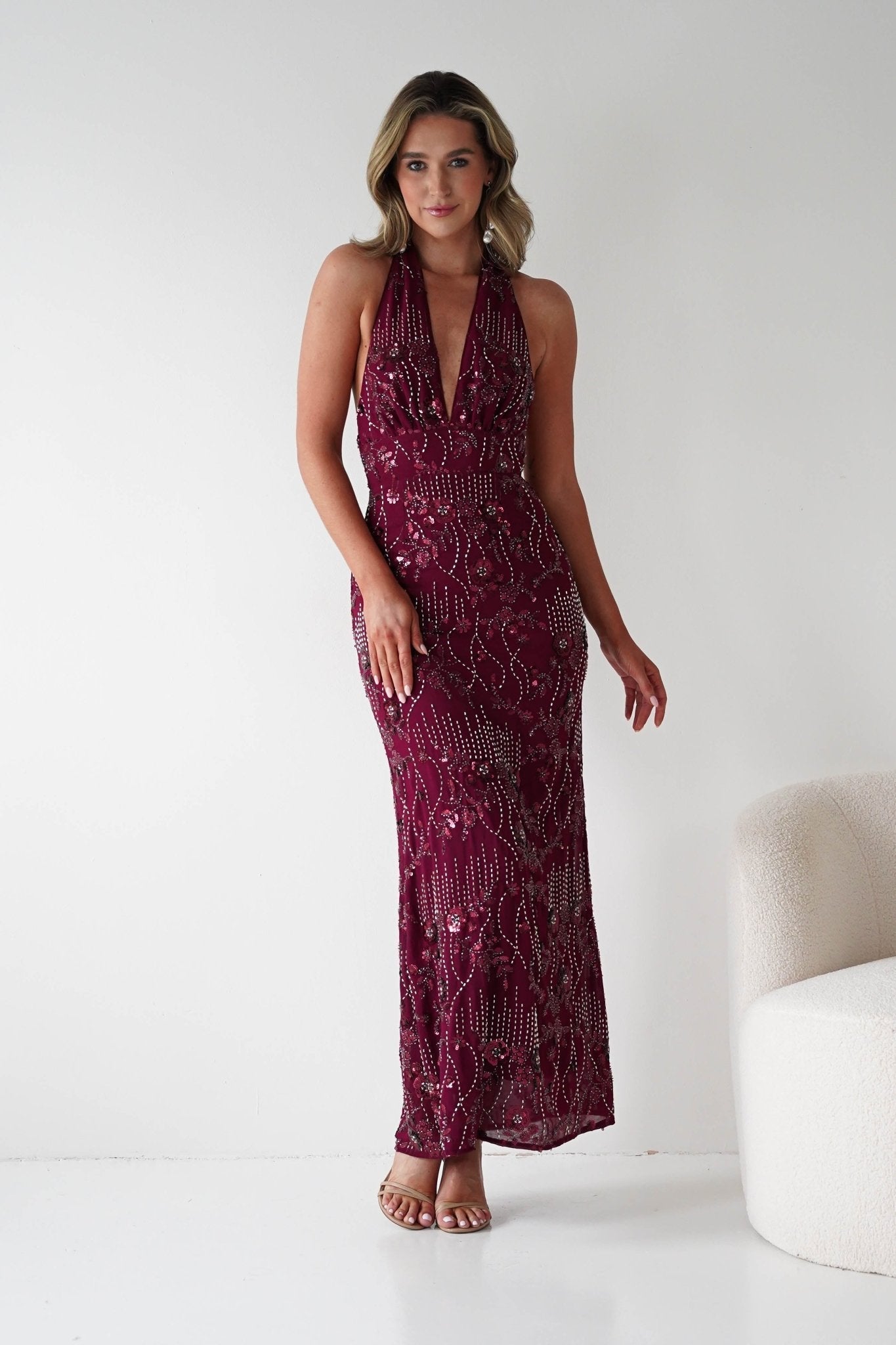 Sabrina Beaded Halterneck Maxi Dress in wine – styled with heels | Velora premium burgundy dresses