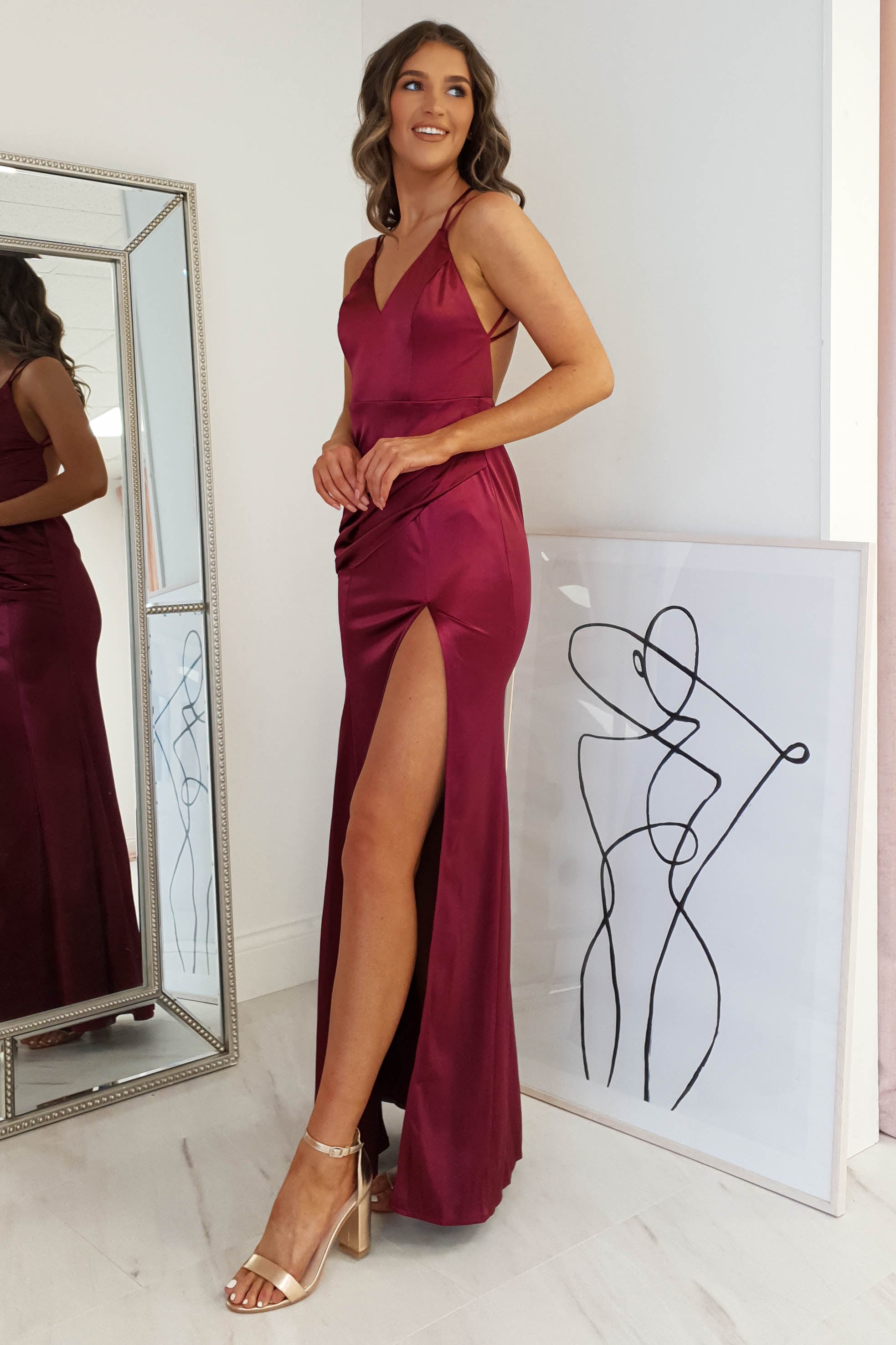Simone Satin Gown in burgundy – styled with heels | Velora premium burgundy dresses